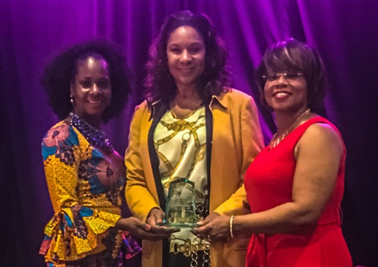 Dr. Ramona Tumblin-Rucker, PEng, MBA, MPM, CHC, D. Mgt., Director of Construction Management at M Property Services (pictured center), receives the “Private Sector Executive of the Year” award from MOKAN Executive Director Yaphett El-Amin (left) and MOKAN Dinner Chair Honorable Jamilah Nasheed (right).
